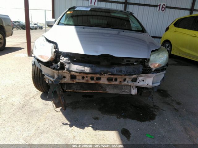 Photo 5 VIN: 1FAHP3K25CL386213 - FORD FOCUS 