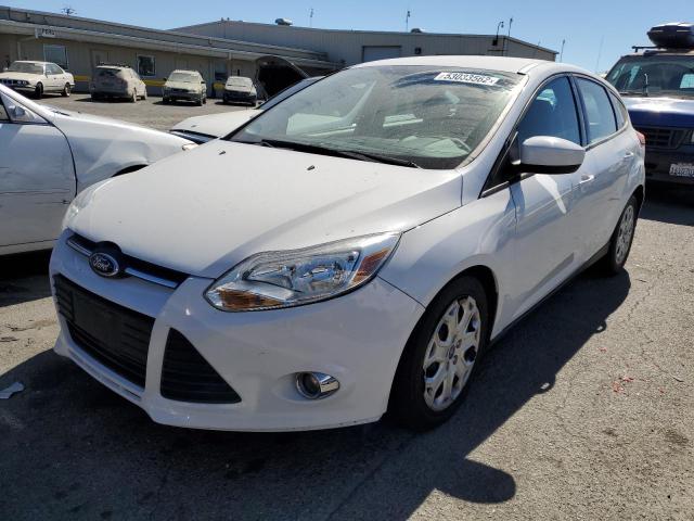 Photo 1 VIN: 1FAHP3K25CL410607 - FORD FOCUS SE 