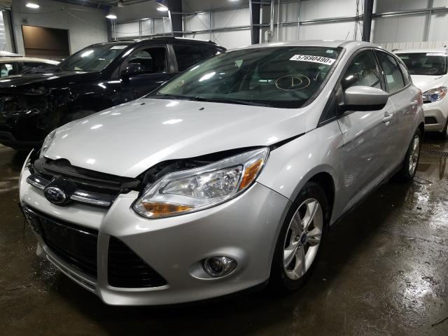 Photo 1 VIN: 1FAHP3K25CL429335 - FORD FOCUS SE 