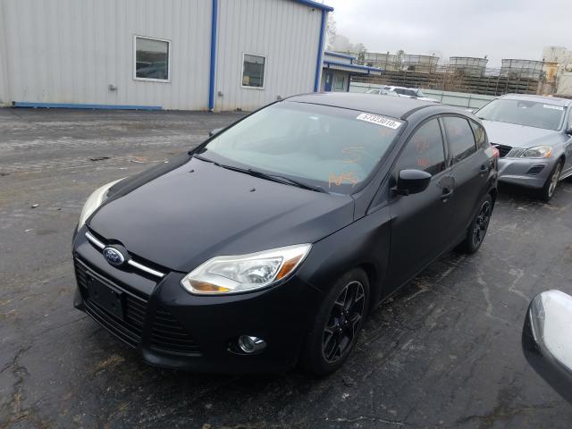 Photo 1 VIN: 1FAHP3K25CL450119 - FORD FOCUS SE 