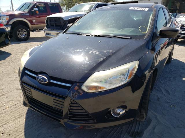 Photo 1 VIN: 1FAHP3K26CL117993 - FORD FOCUS SE 