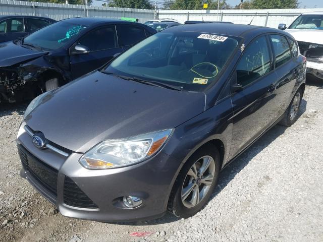 Photo 1 VIN: 1FAHP3K26CL447827 - FORD FOCUS SE 