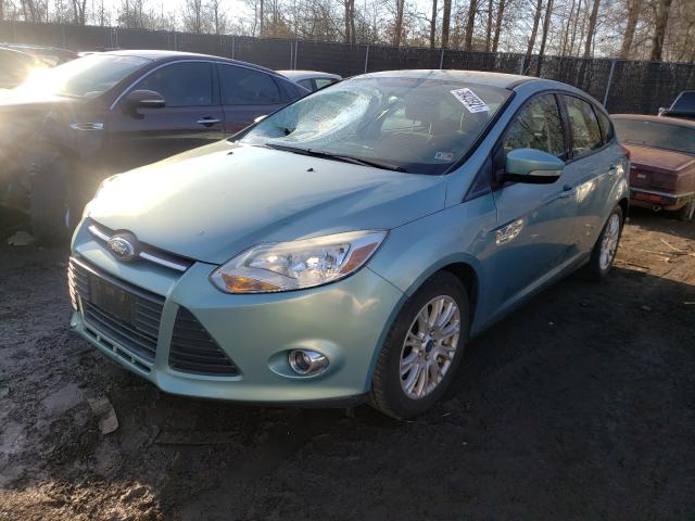 Photo 1 VIN: 1FAHP3K28CL100287 - FORD FOCUS SE 