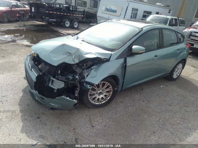 Photo 1 VIN: 1FAHP3K28CL100290 - FORD FOCUS 