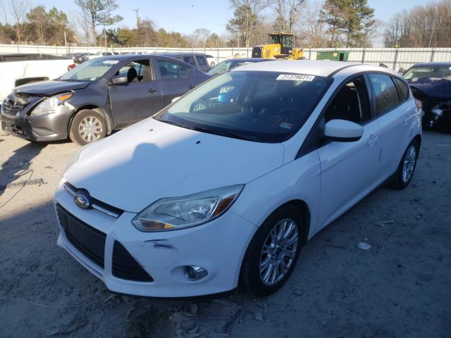 Photo 1 VIN: 1FAHP3K28CL185695 - FORD FOCUS SE 