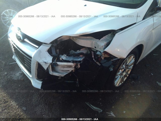 Photo 5 VIN: 1FAHP3K28CL394922 - FORD FOCUS 