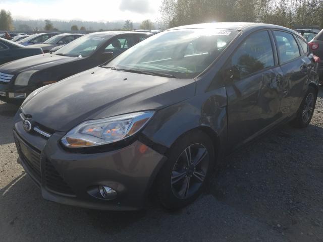 Photo 1 VIN: 1FAHP3K28CL410696 - FORD FOCUS SE 