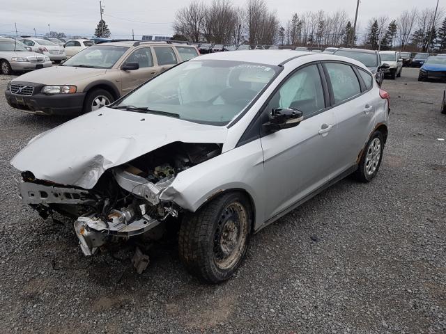 Photo 1 VIN: 1FAHP3K28CL458957 - FORD FOCUS SE 