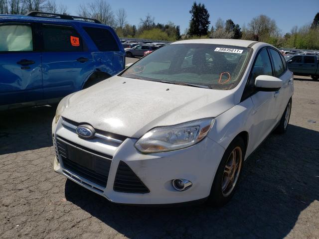 Photo 1 VIN: 1FAHP3K29CL321784 - FORD FOCUS SE 