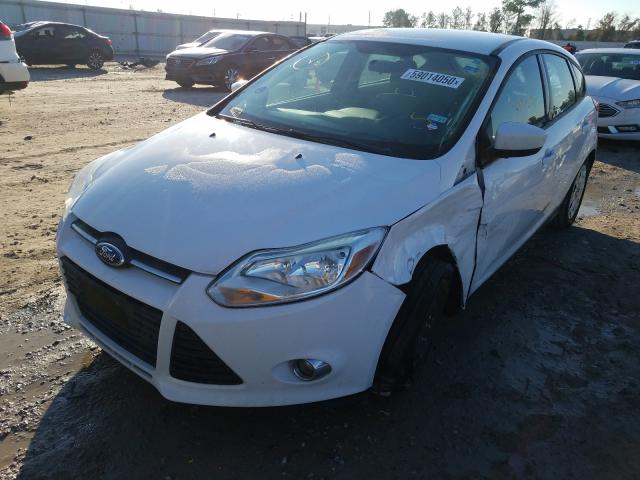 Photo 1 VIN: 1FAHP3K29CL332431 - FORD FOCUS SE 