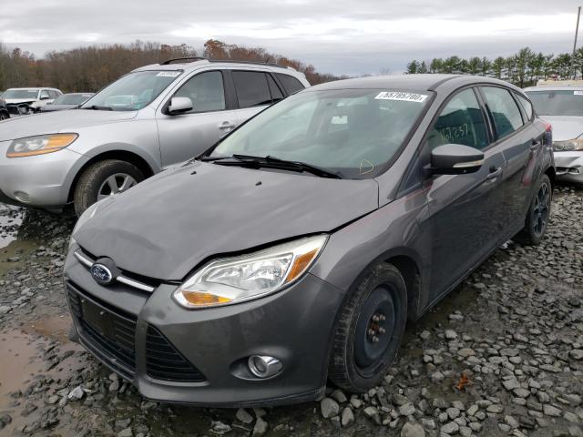 Photo 1 VIN: 1FAHP3K29CL390555 - FORD FOCUS SE 