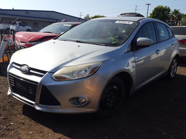 Photo 1 VIN: 1FAHP3K2XCL130830 - FORD FOCUS SE 