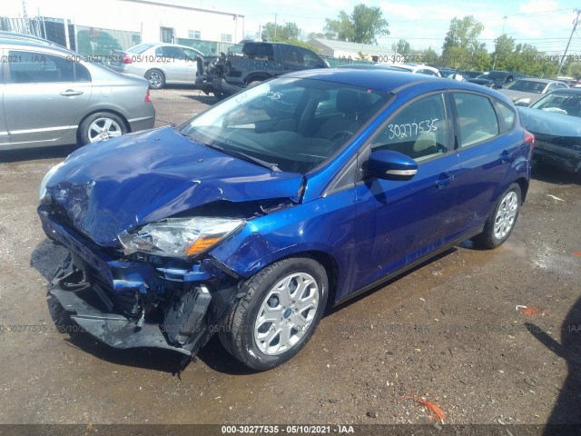 Photo 1 VIN: 1FAHP3K2XCL277908 - FORD FOCUS 