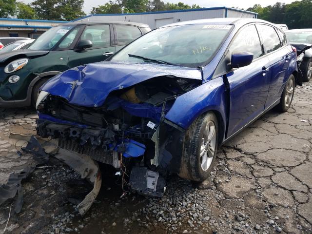 Photo 1 VIN: 1FAHP3K2XCL352753 - FORD FOCUS SE 