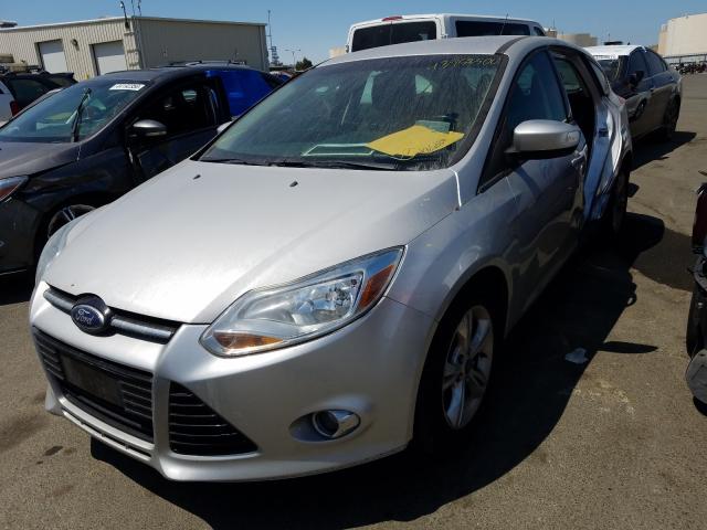 Photo 1 VIN: 1FAHP3K2XCL435857 - FORD FOCUS 