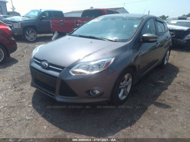 Photo 1 VIN: 1FAHP3K2XCL448883 - FORD FOCUS 