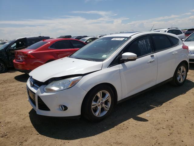 Photo 1 VIN: 1FAHP3K2XCL467160 - FORD FOCUS SE 