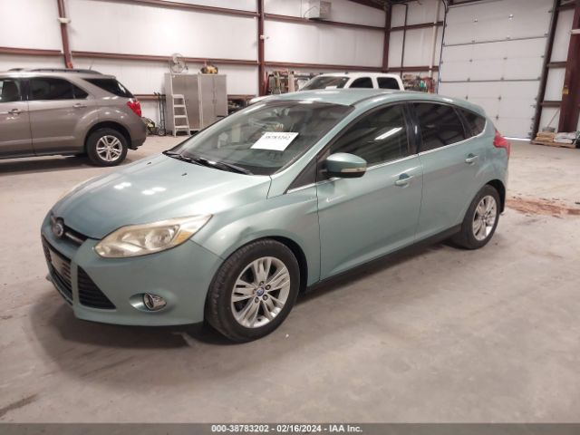 Photo 1 VIN: 1FAHP3M20CL200560 - FORD FOCUS 