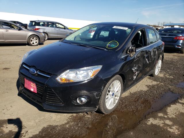 Photo 1 VIN: 1FAHP3M20CL213180 - FORD FOCUS SEL 