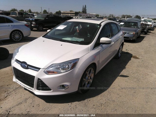 Photo 1 VIN: 1FAHP3M20CL222476 - FORD FOCUS 