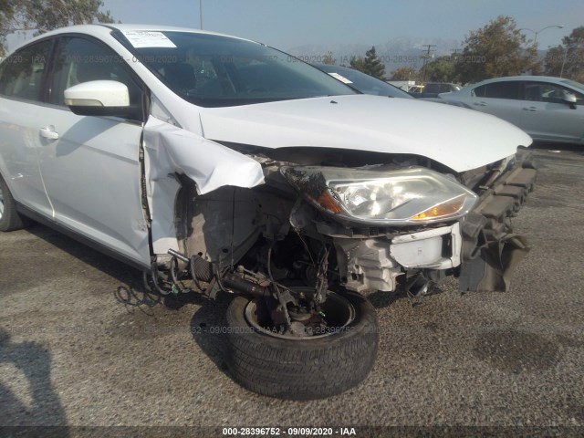 Photo 5 VIN: 1FAHP3M20CL244736 - FORD FOCUS 