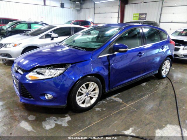 Photo 1 VIN: 1FAHP3M20CL401035 - FORD FOCUS 