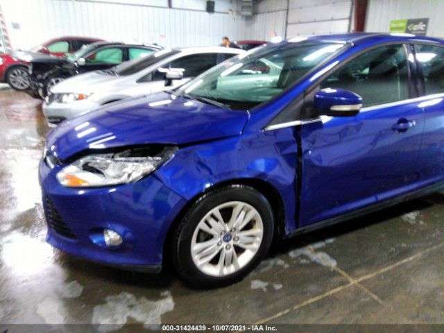 Photo 5 VIN: 1FAHP3M20CL401035 - FORD FOCUS 