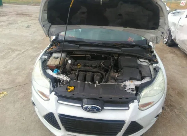 Photo 9 VIN: 1FAHP3M20CL412455 - FORD FOCUS 