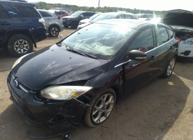 Photo 1 VIN: 1FAHP3M21CL103173 - FORD FOCUS 