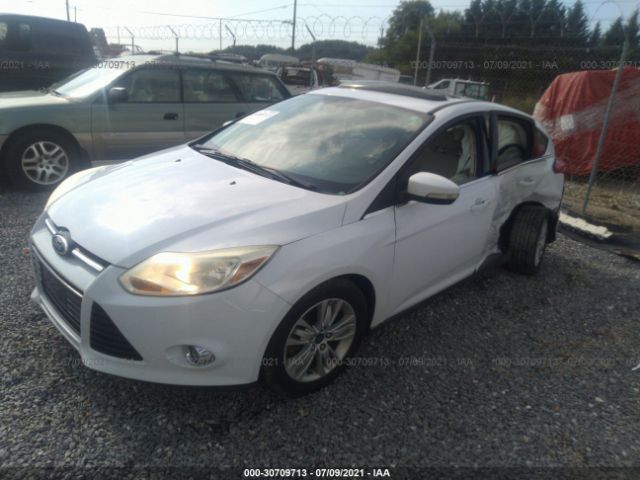 Photo 1 VIN: 1FAHP3M21CL106008 - FORD FOCUS 