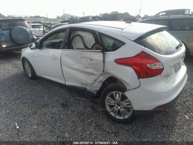 Photo 2 VIN: 1FAHP3M21CL106008 - FORD FOCUS 