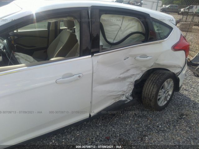 Photo 5 VIN: 1FAHP3M21CL106008 - FORD FOCUS 