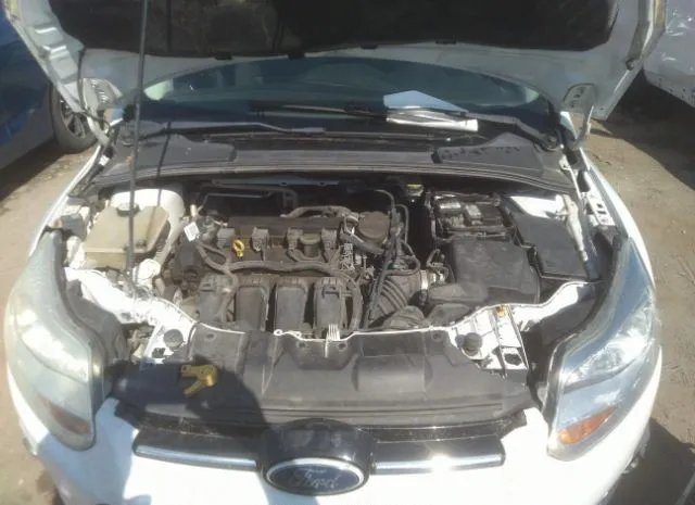 Photo 9 VIN: 1FAHP3M21CL107238 - FORD FOCUS 