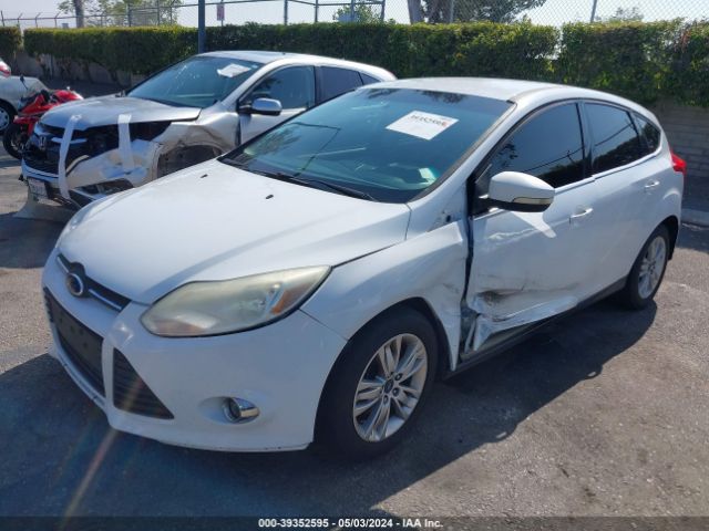 Photo 1 VIN: 1FAHP3M21CL135461 - FORD FOCUS SEL 