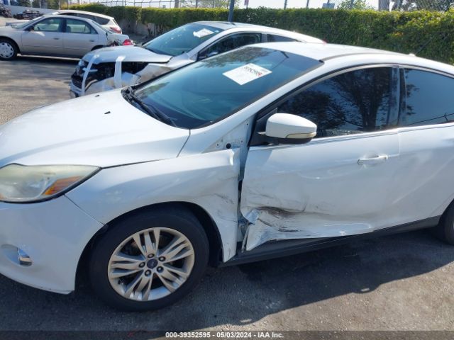 Photo 5 VIN: 1FAHP3M21CL135461 - FORD FOCUS SEL 