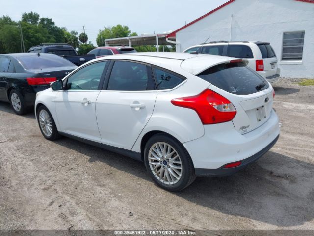 Photo 2 VIN: 1FAHP3M21CL298675 - FORD FOCUS 