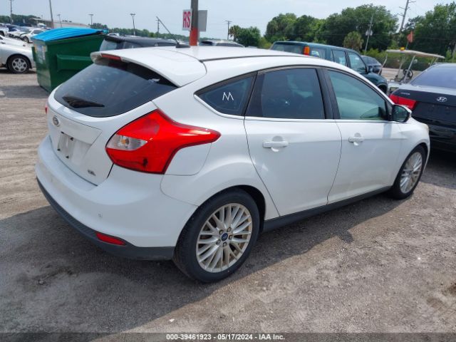 Photo 3 VIN: 1FAHP3M21CL298675 - FORD FOCUS 