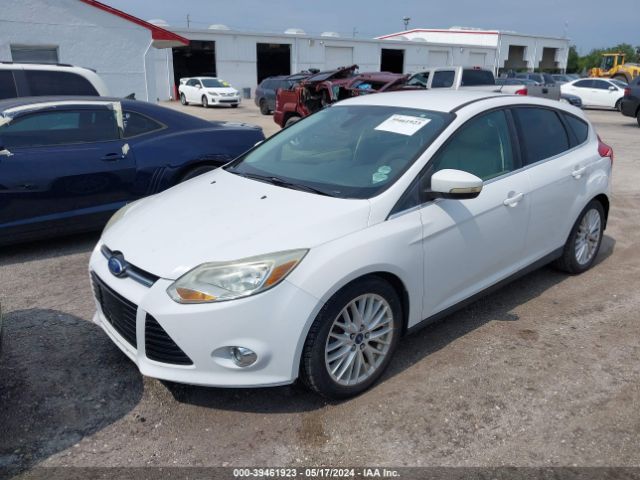 Photo 5 VIN: 1FAHP3M21CL298675 - FORD FOCUS 