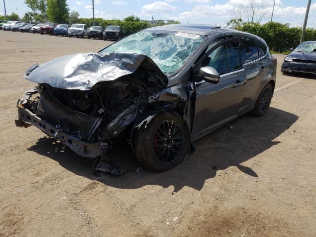 Photo 1 VIN: 1FAHP3M21CL368627 - FORD FOCUS SEL 