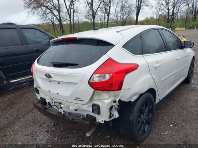 Photo 5 VIN: 1FAHP3M21CL409127 - FORD FOCUS 