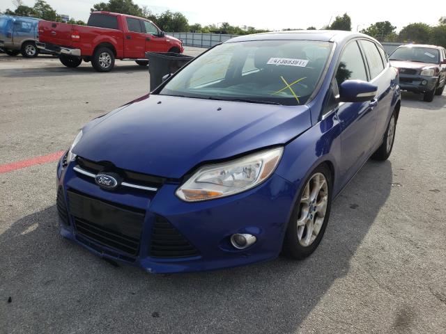 Photo 1 VIN: 1FAHP3M21CL412545 - FORD FOCUS SEL 