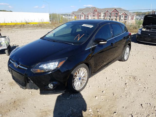 Photo 1 VIN: 1FAHP3M22CL220518 - FORD FOCUS SEL 