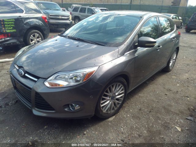 Photo 1 VIN: 1FAHP3M22CL318951 - FORD FOCUS 