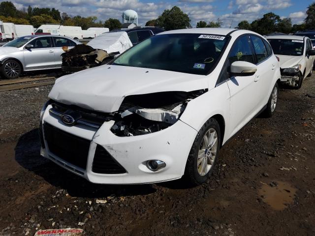 Photo 1 VIN: 1FAHP3M22CL331716 - FORD FOCUS SEL 