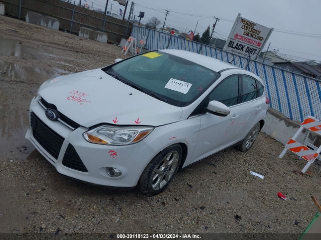 Photo 1 VIN: 1FAHP3M22CL354297 - FORD FOCUS 