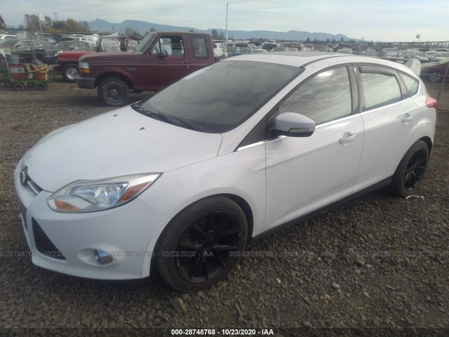 Photo 1 VIN: 1FAHP3M22CL424722 - FORD FOCUS 