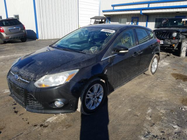 Photo 1 VIN: 1FAHP3M23CL120721 - FORD FOCUS SEL 