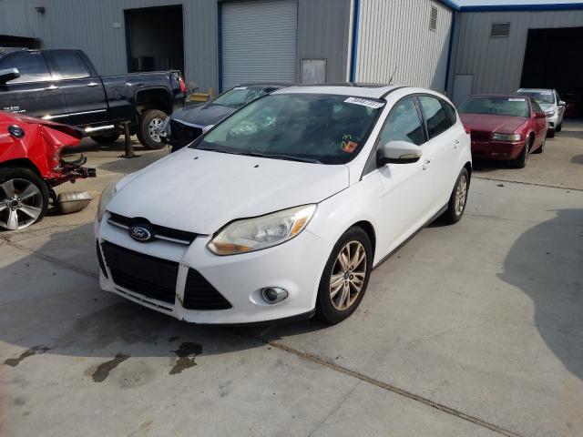 Photo 1 VIN: 1FAHP3M23CL207048 - FORD FOCUS SEL 