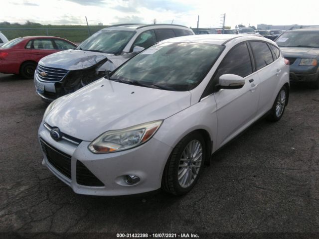 Photo 1 VIN: 1FAHP3M23CL210533 - FORD FOCUS 