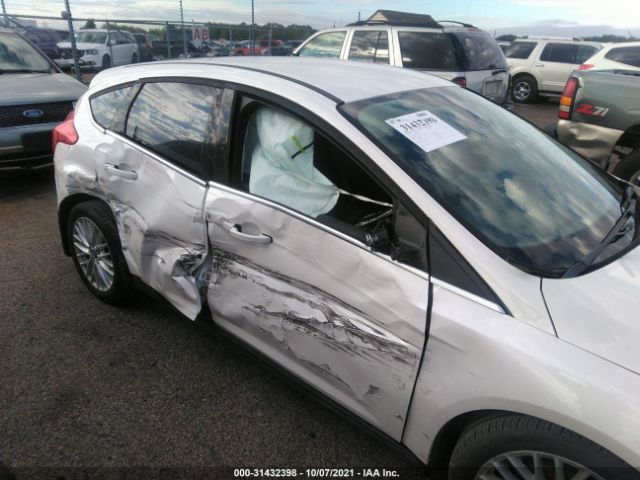 Photo 5 VIN: 1FAHP3M23CL210533 - FORD FOCUS 